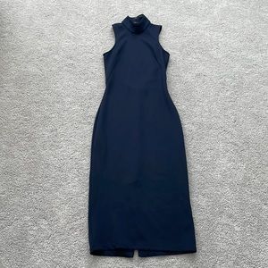 Blue Mock Neck Dress from H&M Dress in a size 2. Dress has a deep key hole.